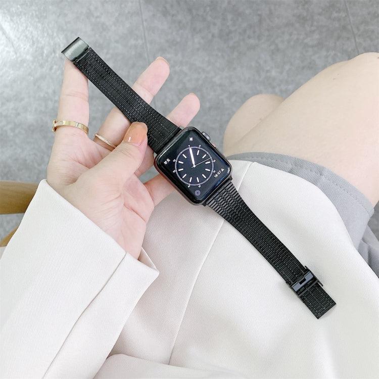 steel replacement strap for Apple Watch shown on hand with black dial and mesh design in modern setting