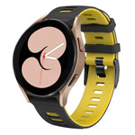 20mm two-color silicone watch band for Samsung Galaxy Watch 5 in black and yellow design.