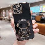 Electroplating Astronaut Holder Phone Case, For iPhone 17e / 16e, For iPhone 17 Pro Max, For iPhone 17 Pro, For iPhone 17, For iPhone Air, For iPhone 16 Pro Max, For iPhone 16 Pro, For iPhone 16 Plus